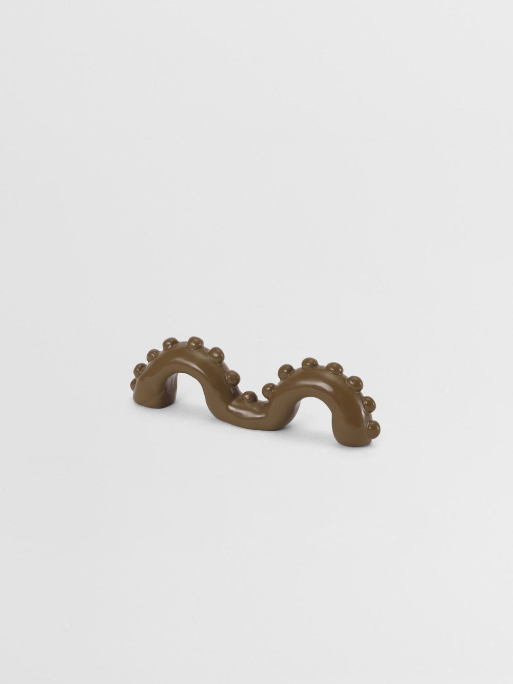 Olive Green organic shaped pull on a light gray background