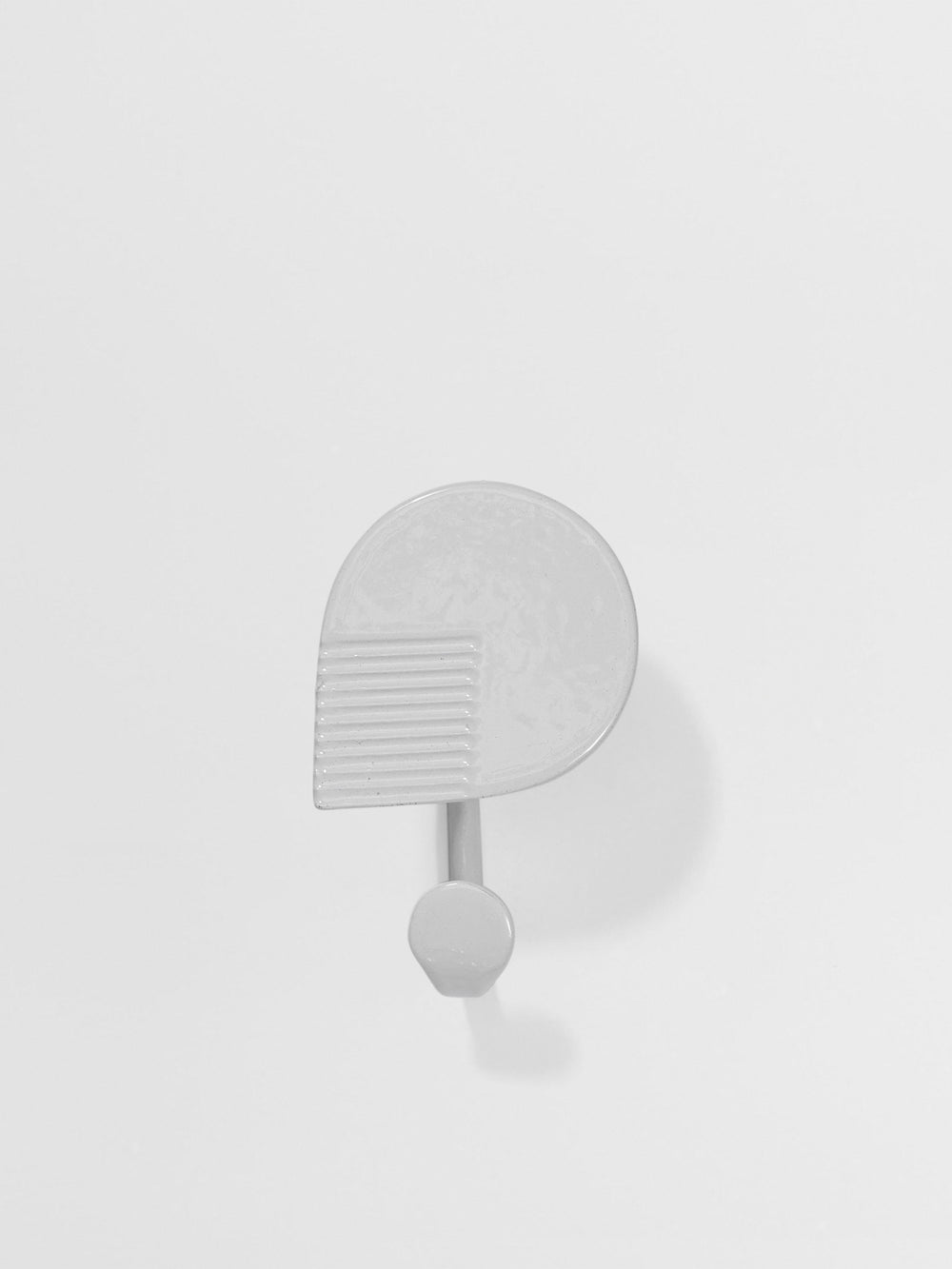 White wall Hook on a light gray background