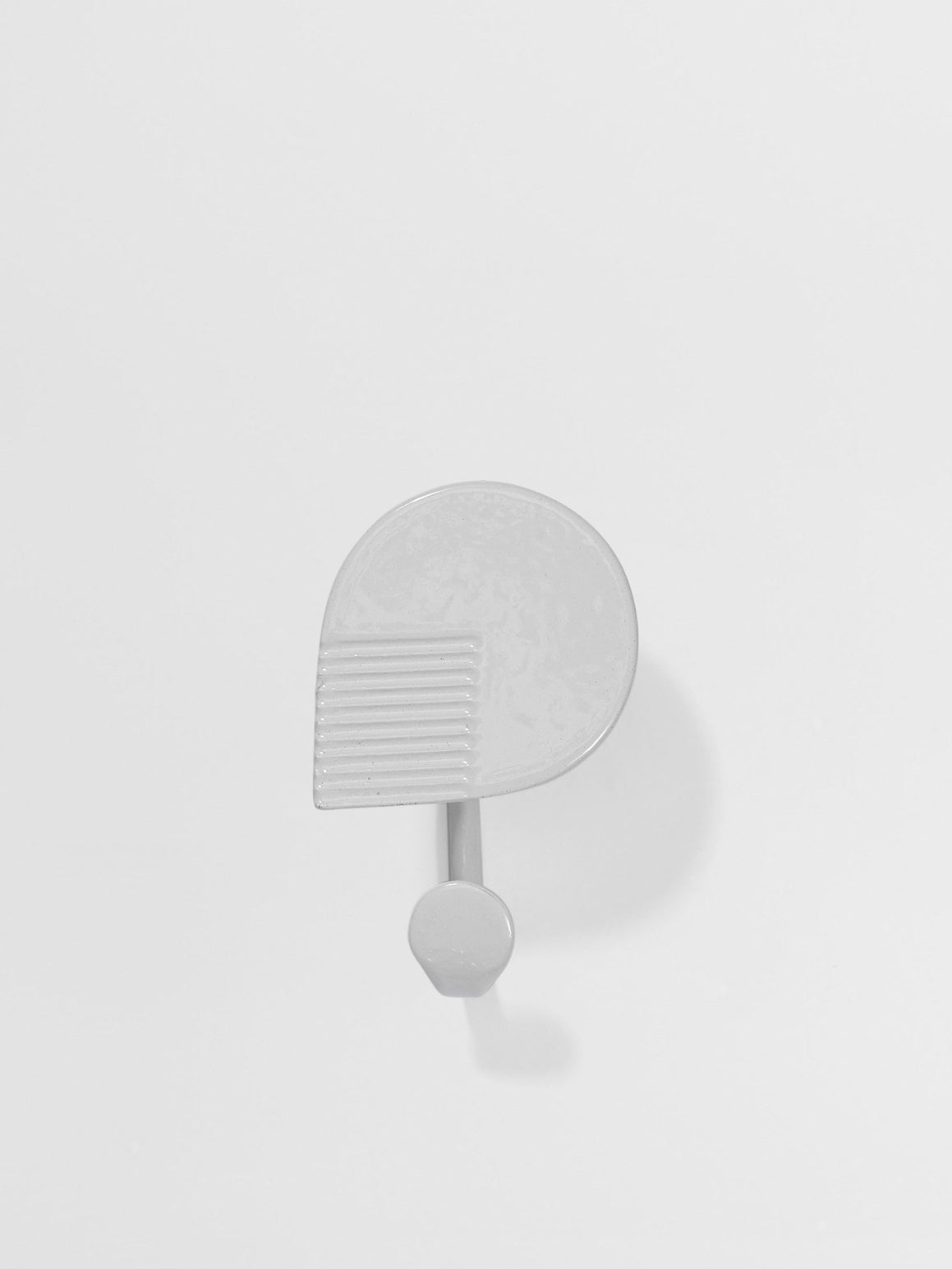 White wall Hook on a light gray background