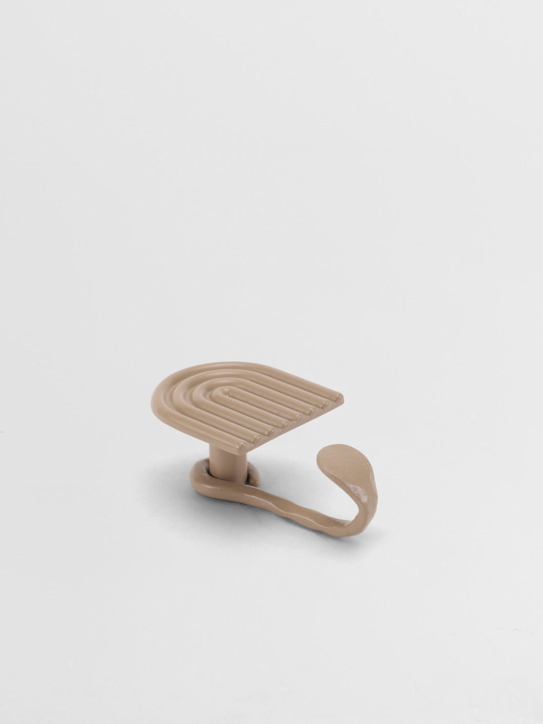 Beige Towel hook on a light gray background