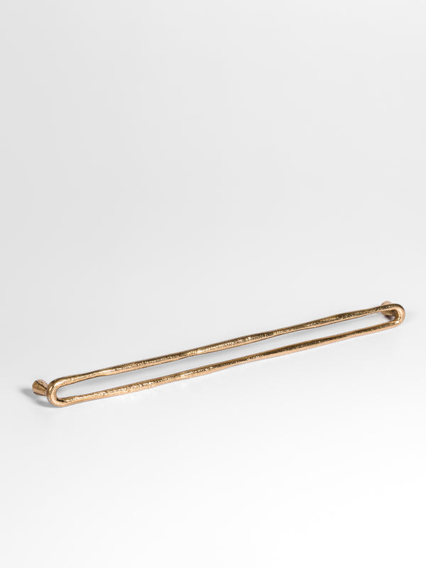 A left side view of the bronze finish kitchen pull bar handle