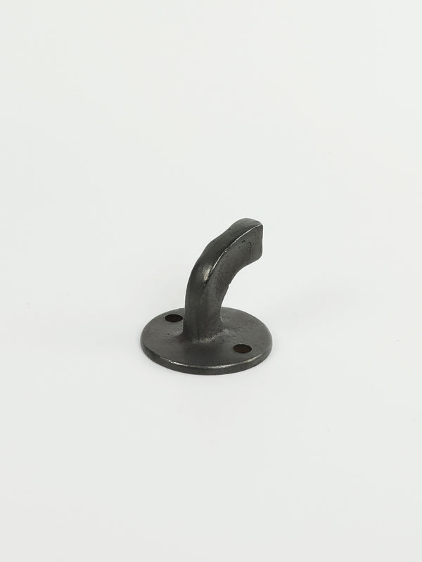 Use of a natural brass towel hook hanger