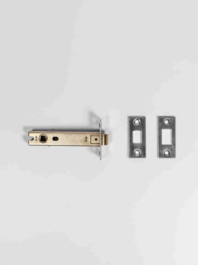 A top view of a polished nickel colored door latch