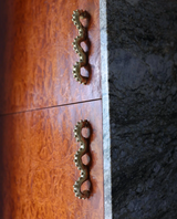 Forme N°39 brass pulls installed on wood cabinetry