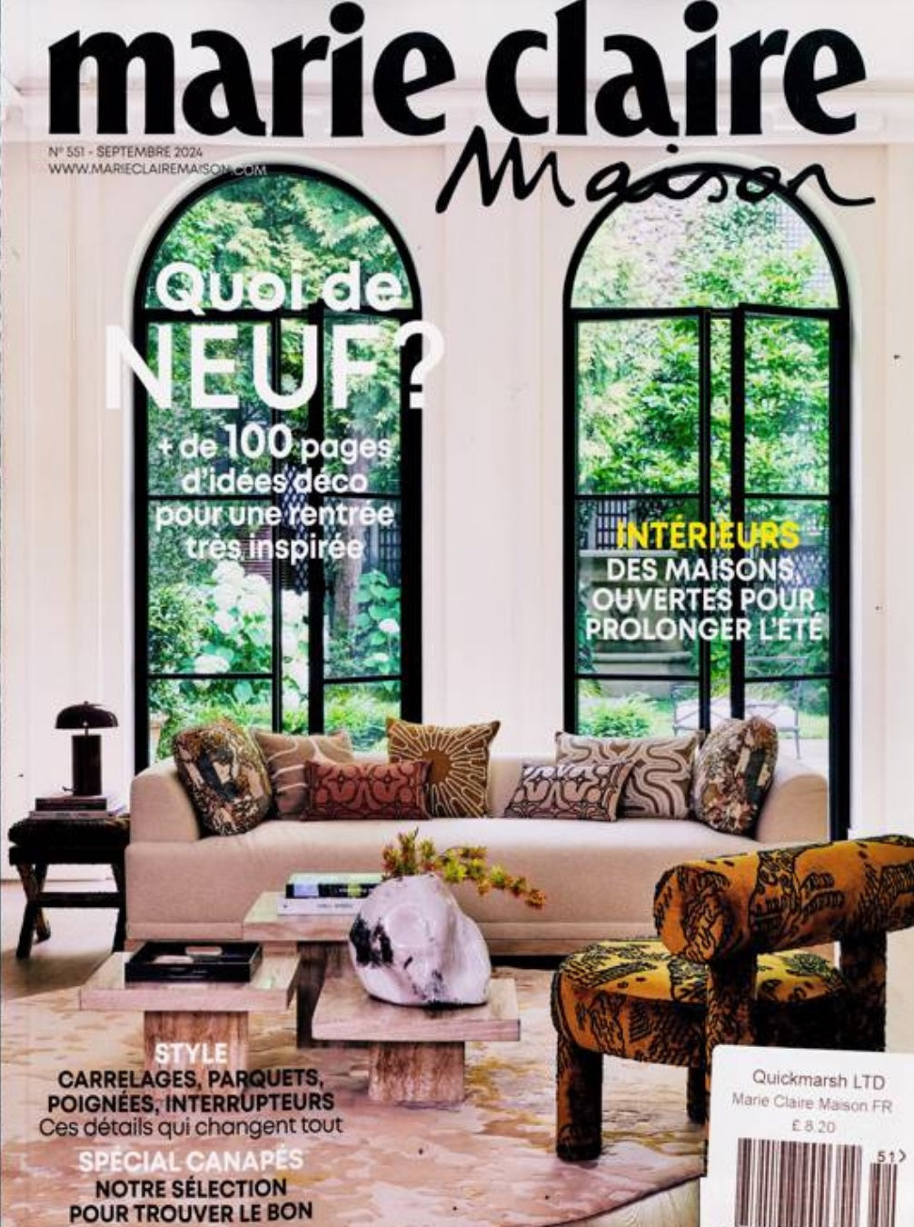 Marie Claire magazine cover with a living room scene and large windows.