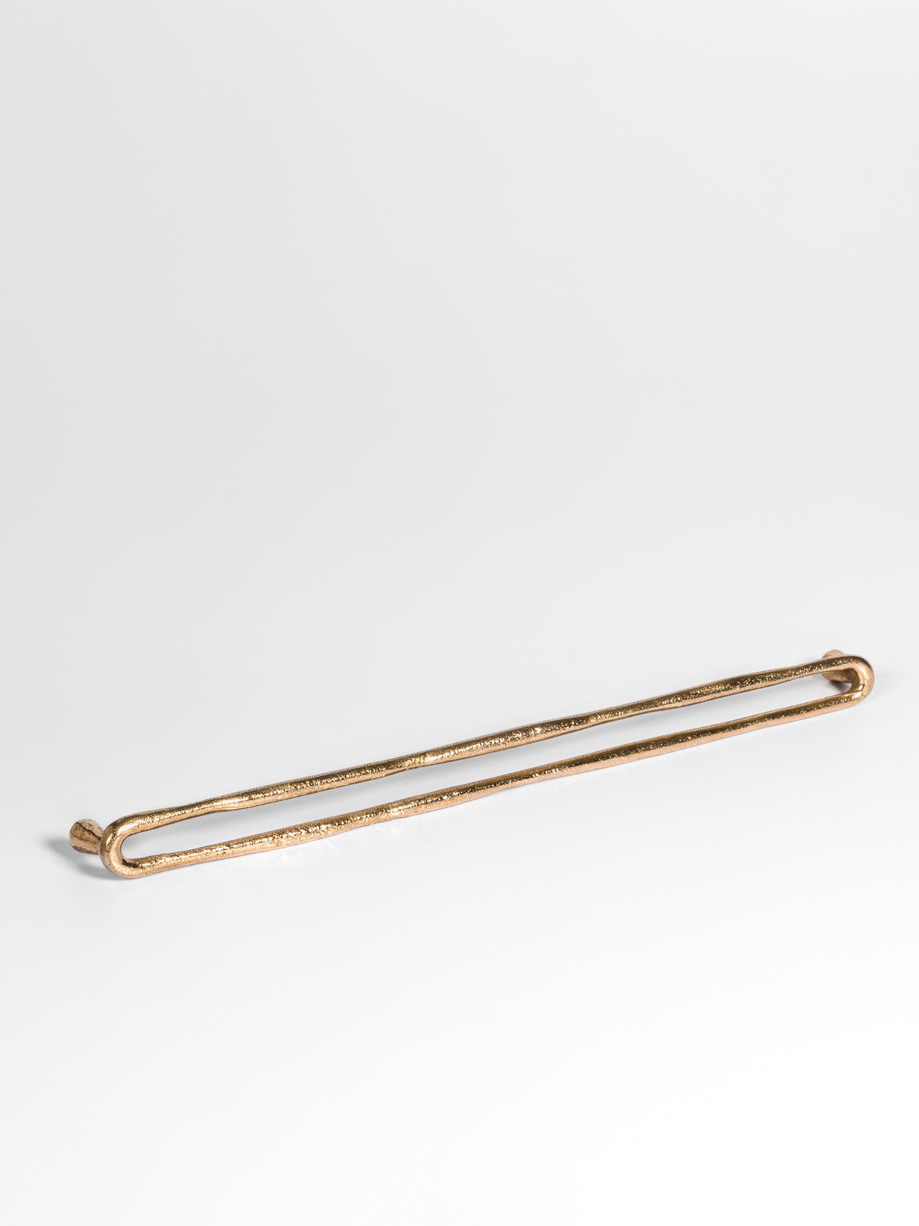 A left side view of the bronze finish kitchen pull bar handle