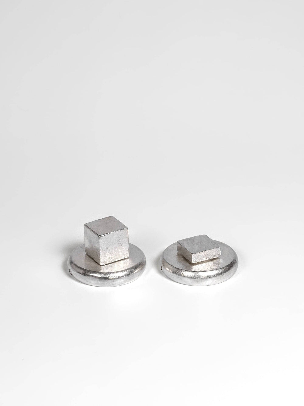 A front side view of a satin nickel finish privacy door lever set 