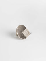Left side view of a  satin nickel colored oversized drawer pull