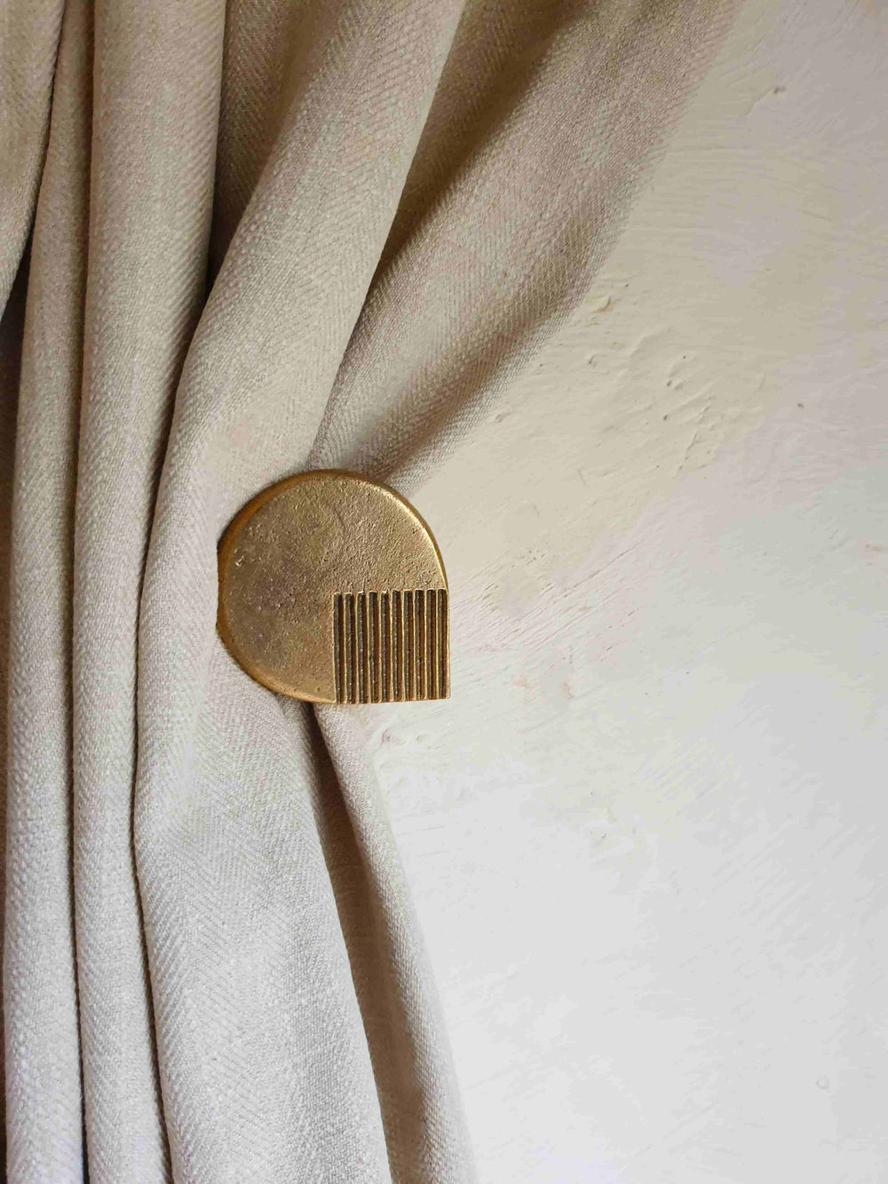 A front view of curtain tiebacks 
